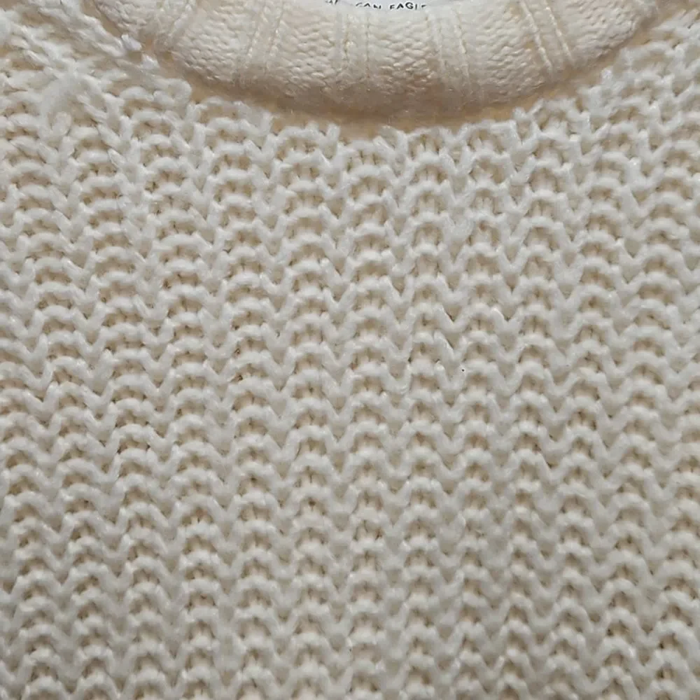 American eagle ivory sweater, small